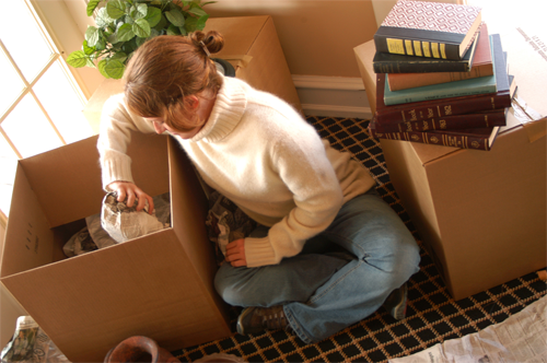 packing-supplies A woman packs boxes